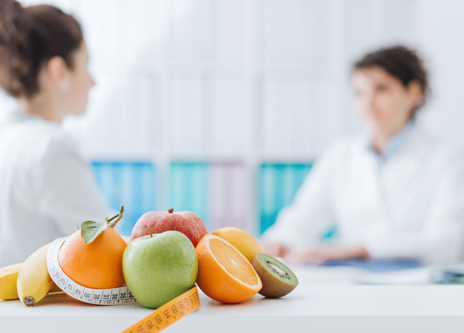 Nutritionist meeting a patient in the office